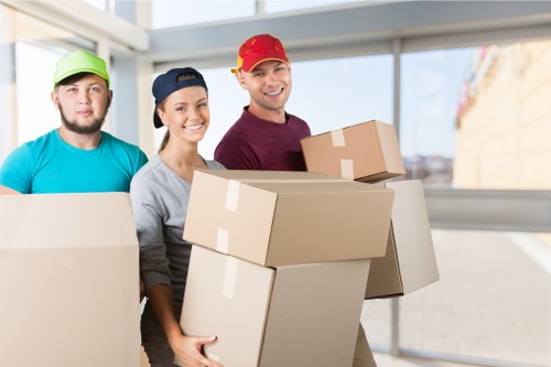 Loading furniture and office supplies for a commercial move in West London