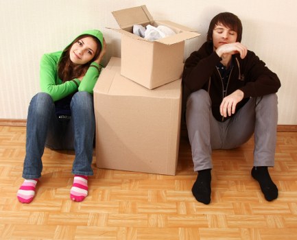 Packed boxes and furniture ready for transport during a house move