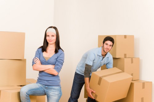 Team handling household items as part of a booked removal