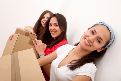 Moving boxes and household items handled in a Notting Hill property