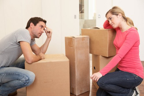 Packed boxes and furniture prepared for a flat or house removal in Notting Hill