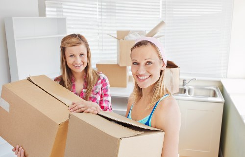 Careful furniture moving inside a Notting Hill home