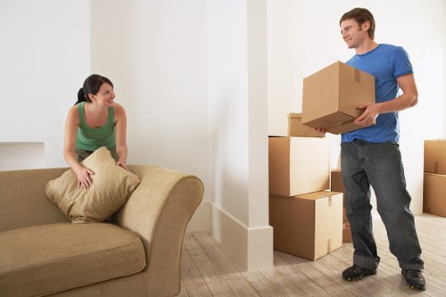 Packed boxes and furniture ready for a house move in Notting Hill