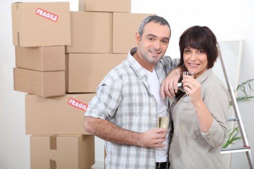 Packed boxes and furniture ready for removals in a Notting Hill flat
